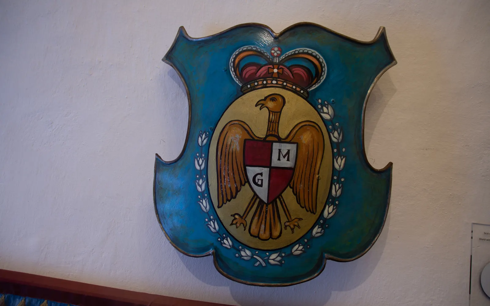 The coat of arms of Queen Marie of Romania at Bran Castle